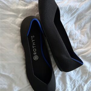 Rothy's Black and Blue Trim Flats